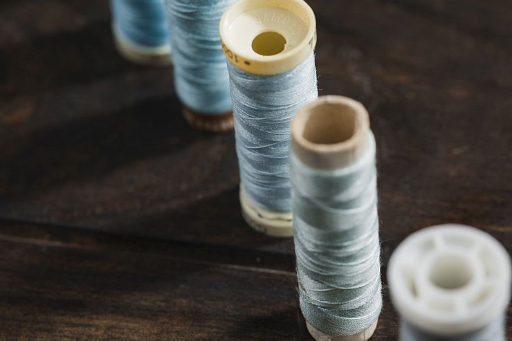 comparison of synthetic fibers showing advantages and disadvantages in textile production infographic background