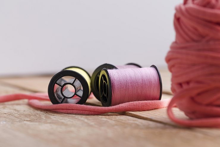 pink synthetic fibers close-up texture background