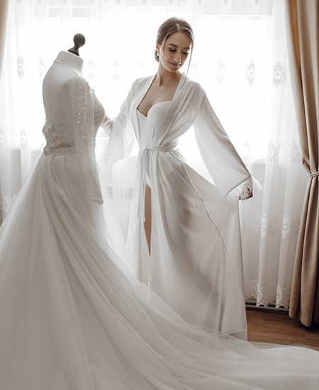 Bridal Underwear Sewing – How Wedding Lingerie Is Made Bridal underwear sewing process in a sewing workshop, showing the production of elegant wedding lingerie with lace and fine fabrics.